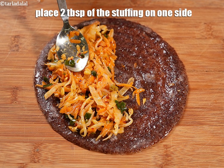 Step 38 – Place 2 tbsp of the stuffing on one side.