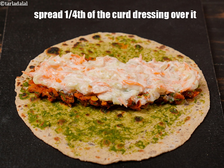 Step 38 – Spread 1/4th of the curd dressing over it.