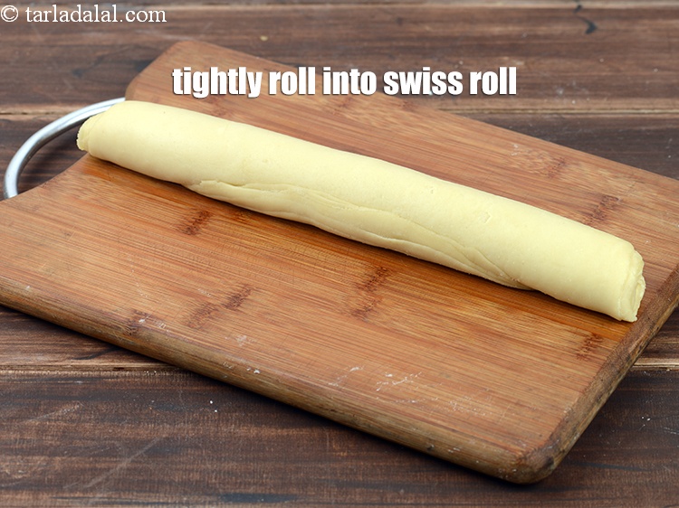 Step 40 – Tightly roll into a swiss roll.