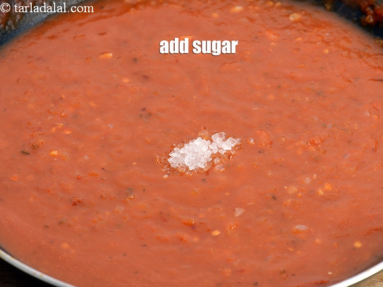 Step 40 – Add &frac12; tsp <a href="https://www.tarladalal.com/glossary-sugar-chini-shakkar-278i">sugar</a>.