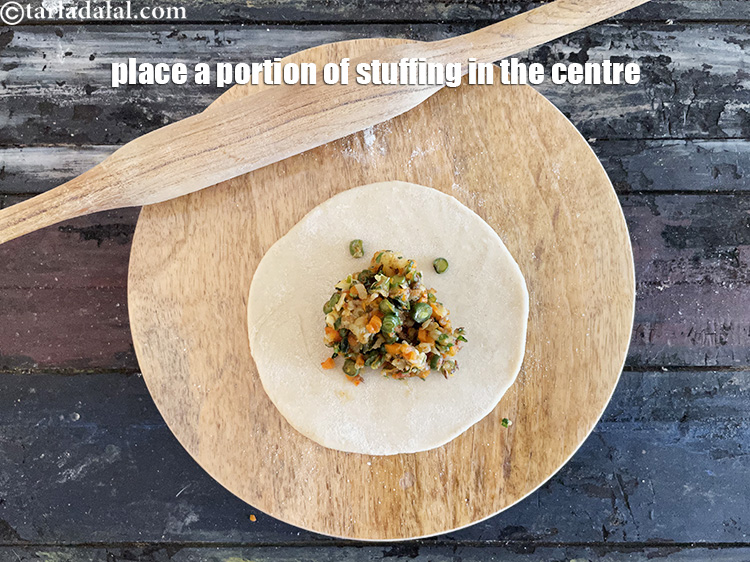 Step 36 – Place a portion of stuffing in the centre of the circle.
