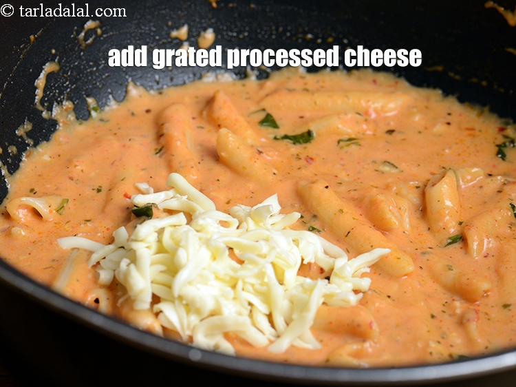 Step 40 – Add &frac14; cup&nbsp;<a href="https://www.tarladalal.com/glossary-grated-processed-cheese-868i">grated processed cheese</a>.