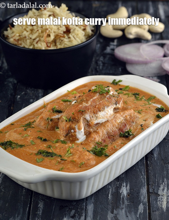 Step 37 – Serve the <strong>Malai Koftas</strong> with <a href="https://www.tarladalal.com/Parathas--Plain-Paratha-Basic-Paratha-Recipe-2170r">Plain Paratha</a> and <a href="https://www.tarladalal.com/Jeera-Rice-Quick-Jeera-Rice-Recipe-30920r">Jeera Rice.</a>