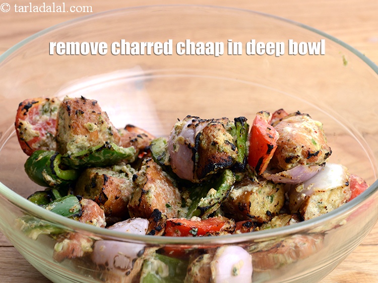 Step 42 – Remove the charred chaap in a deep bowl.