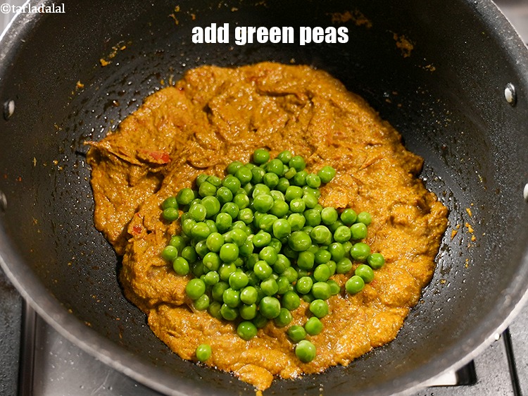 Step 40 – Add &frac12; cup&nbsp;<a href="https://www.tarladalal.com/glossary-green-peas-matar-hare-matar-vatana-180i">green peas</a>.