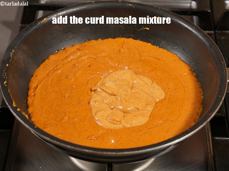 Step 39 – Add the curd masala mixture.