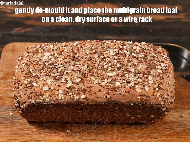 Step 38 – Gently de-mould it and place the <strong>multigrain bread loaf</strong> on a clean, dry surface or …