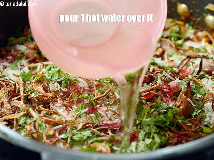 Step 39 – Pour 1&frac12; cups of hot water over it.