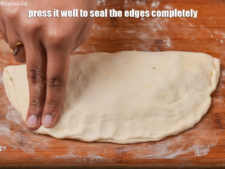 Step 40 – Press it well to seal the edges completely.