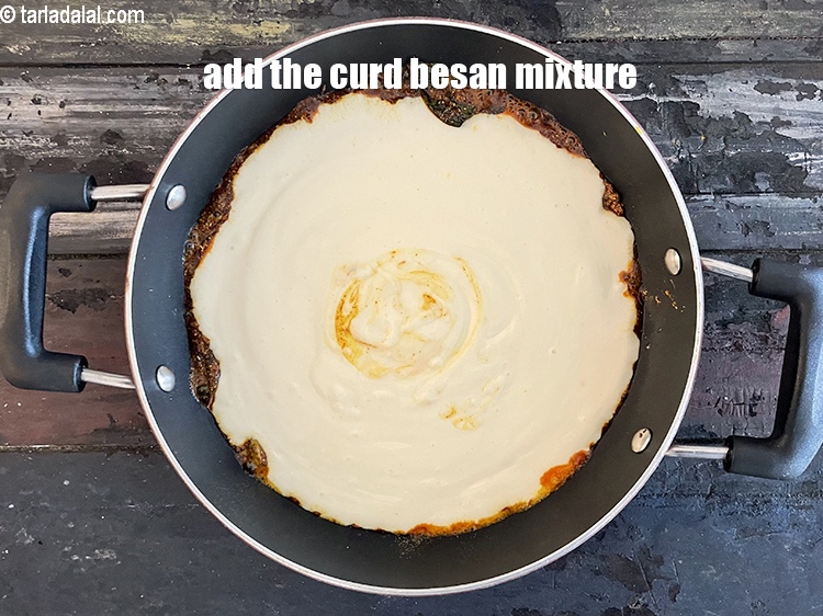 Step 40 – Add the curd besan mixture.