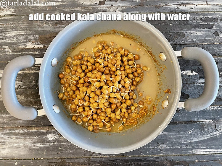 Step 47 – <meta charset="UTF-8" />Add the kala chana (along with water in which they were cooked).