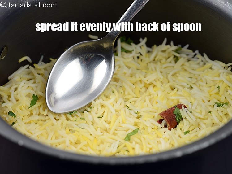 Step 44 – Spread it evenly with the back of a spoon.