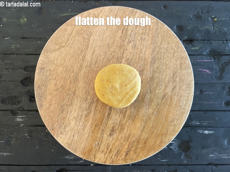 Step 39 – Flatten the dough.