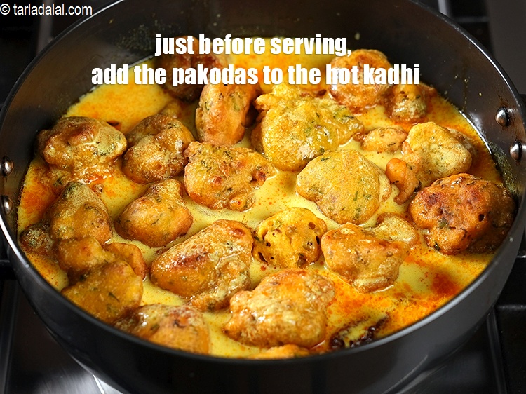Step 40 – Just before serving, add the pakodas to the hot kadhi.