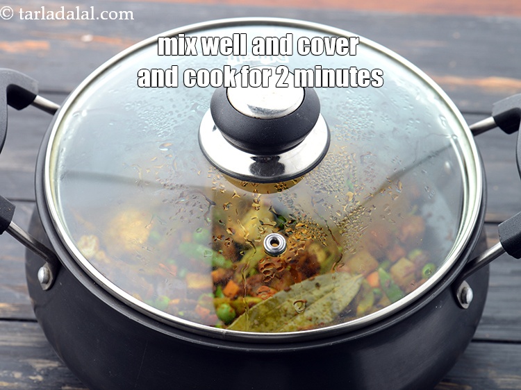 Step 40 – Mix well and cover with a lid and cook on a medium flame for 2 …