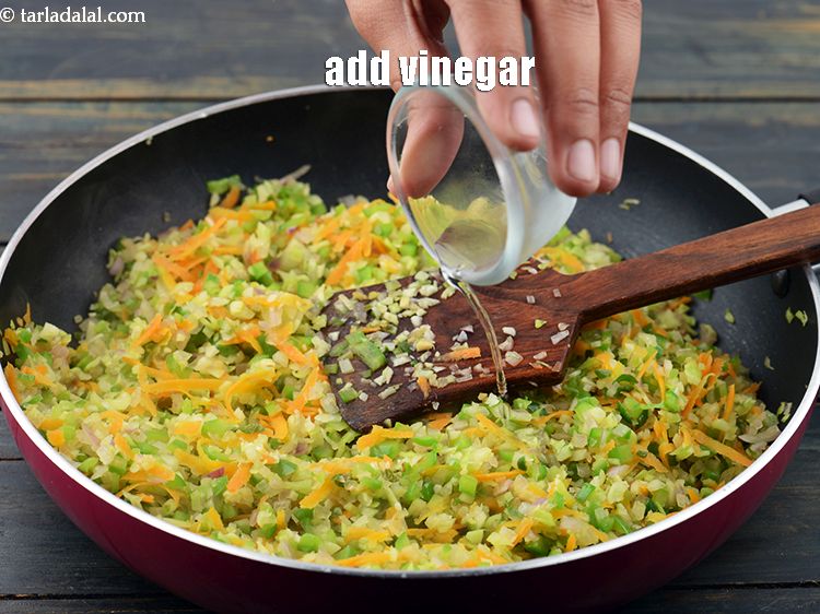 Step 41 – Add 2 tsp <a href="https://www.tarladalal.com/glossary-vinegar-sirka-cooking-vinegar-341i">vinegar</a>