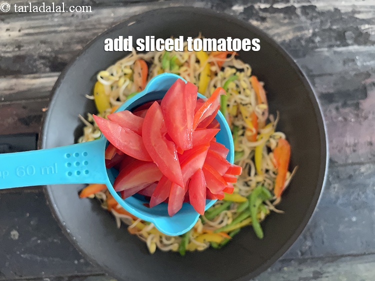 Step 41 – Add&nbsp;<meta charset="UTF-8" />1/2 cup&nbsp;deseeded and&nbsp;<a href="glossary-sliced-tomatoes-746i">sliced tomatoes</a>.