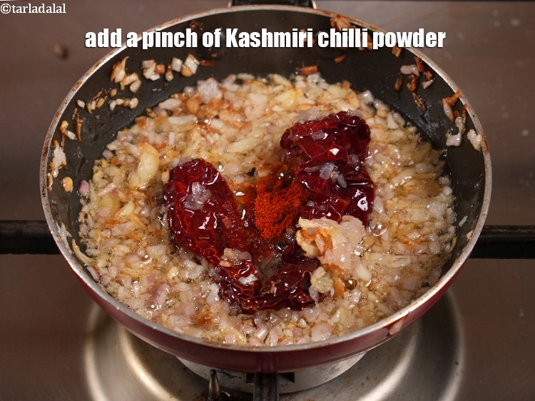 Step 40 – Switch off the flame, add a pinch of Kashmiri chilli powder.