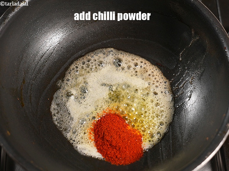 Step 41 – Add 2 tsp <a href="https://www.tarladalal.com/glossary-chilli-powder-red-chilli-powder-339i">chilli powder</a>.
