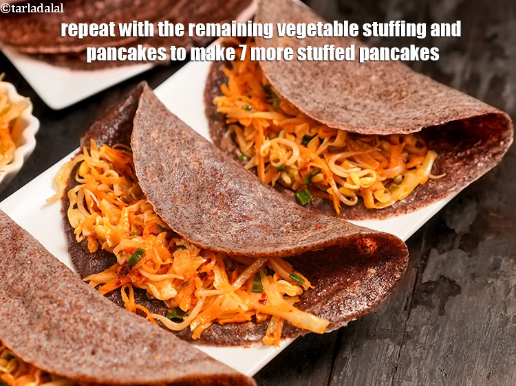 Step 39 – Repeat with the remaining vegetable stuffing and pancakes to make 7 more stuffed pancakes.