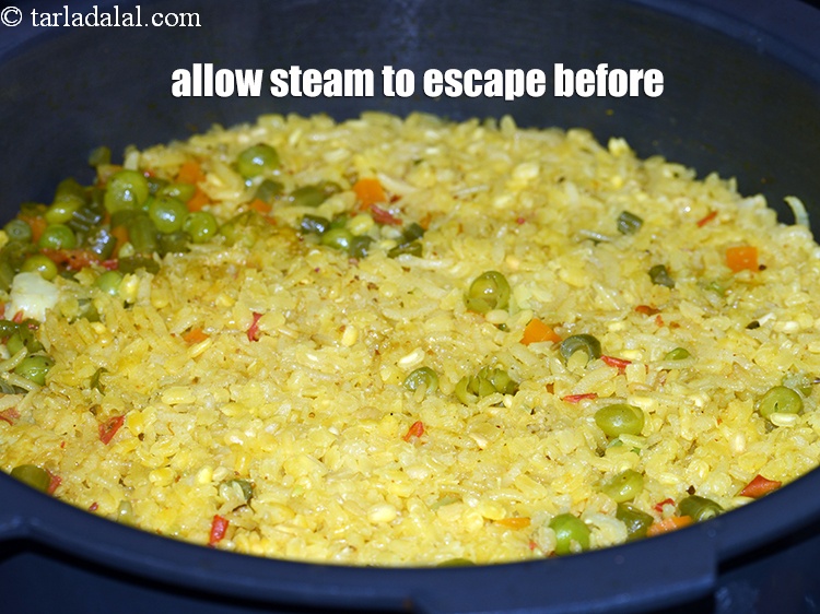 Step 41 – Allow the steam to escape before opening the lid.