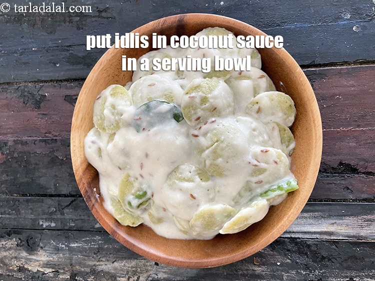 Step 41 – <meta charset="UTF-8" /> Put <strong>idlis in&nbsp;coconut sauce</strong> in a serving bowl.
