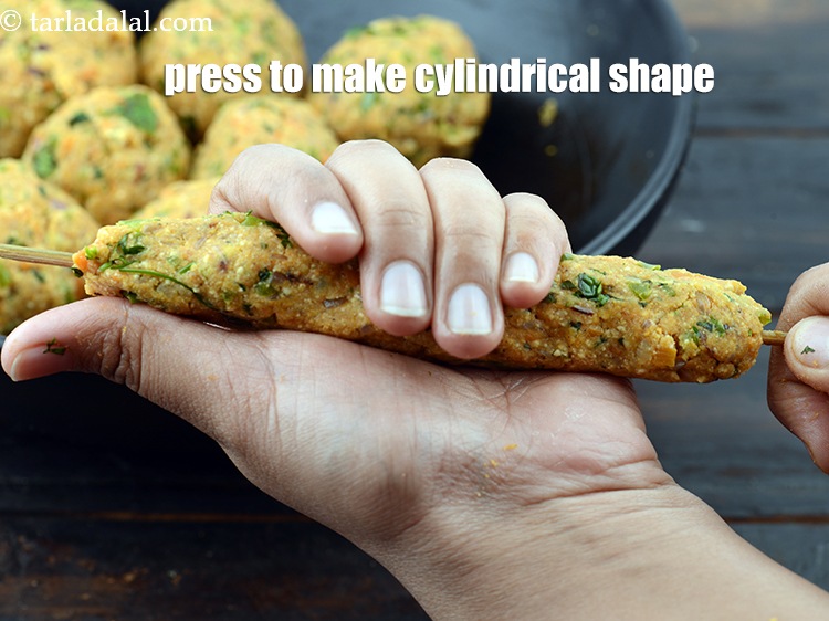 Step 40 – Press the mixture in cylindrical shape to make seekh kebab.