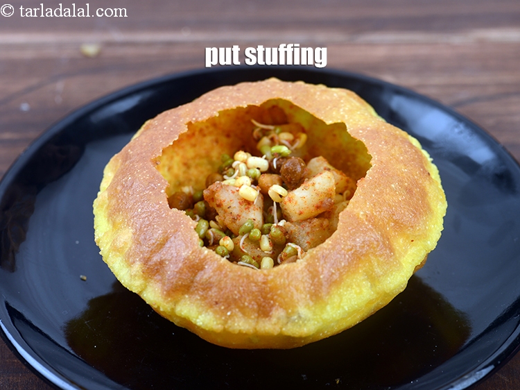 Step 43 – Put approx. &frac12; cup of the stuffing.