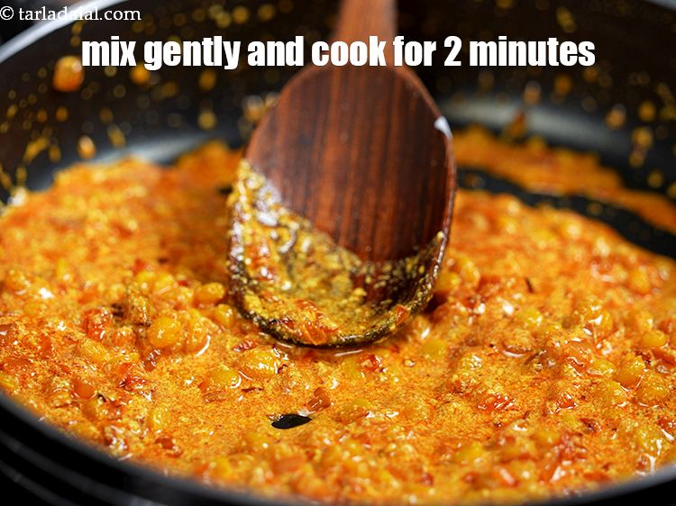 Step 41 – Mix gently and cook on a medium flame for 2 minutes, while stirring continuously. Keep …