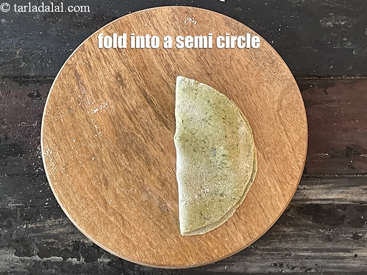 Step 40 – Fold it to make a semi-circle.