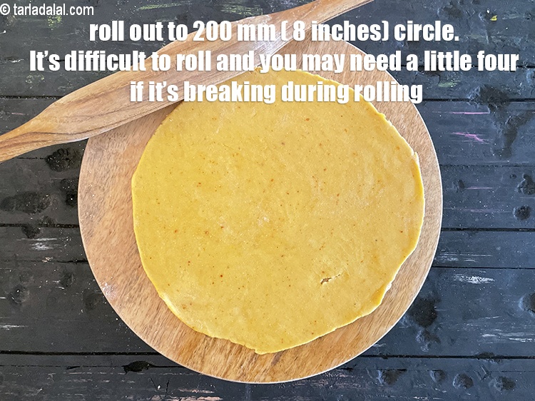 Step 40 – <meta charset="UTF-8" /> Roll a portion of the dough into 200 mm. (8&rdquo;) diameter circle<u><em> …