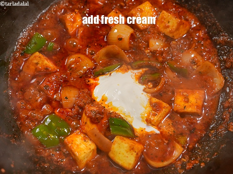 Step 42 – <p>Add 2 tbsp <a href="https://www.tarladalal.com/glossary-fresh-cream-1877i">fresh cream</a>.</p>