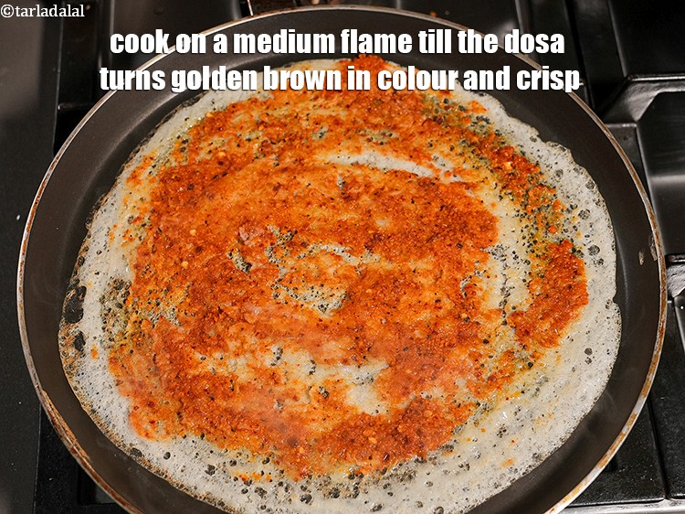 Step 41 – Cook on a medium flame till the dosa turns golden brown in colour and crisp.
