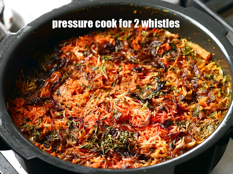 Step 41 – Pressure cook the biryani for 2 whistles on medium flame. Allow the steam to escape …