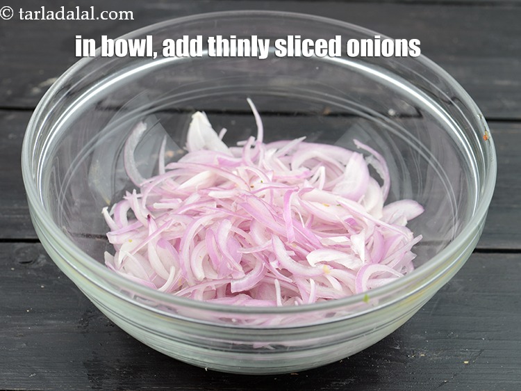 Step 48 – In a bowl, add 1 cup&nbsp;thinly&nbsp;<a href="https://www.tarladalal.com/glossary-sliced-onions-745i">sliced onions</a>.&nbsp;