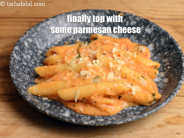 Step 43 – Finally top it with some <a href="https://www.tarladalal.com/glossary-parmesan-cheese-314i">parmesan cheese</a>.