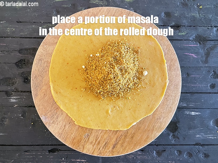Step 41 – Place a portion of the masala over it.