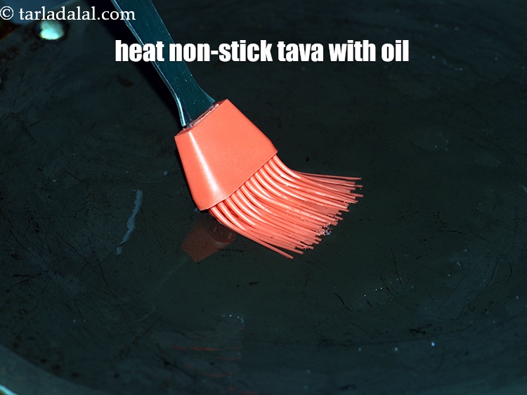 Step 42 – Heat non-stick tava with oil.&nbsp;