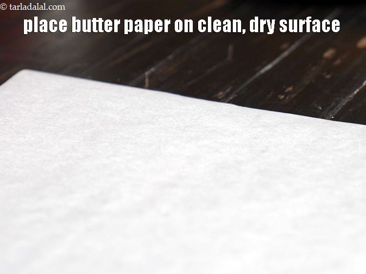 Step 42 – Place the butter paper on a clean, dry surface.&nbsp;