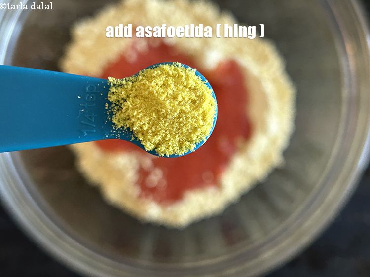 Step 11 – Add&nbsp;<meta charset="UTF-8" />1/4 tsp&nbsp;<a href="glossary-asafoetida-hing-113i">asafoetida (hing)</a>.