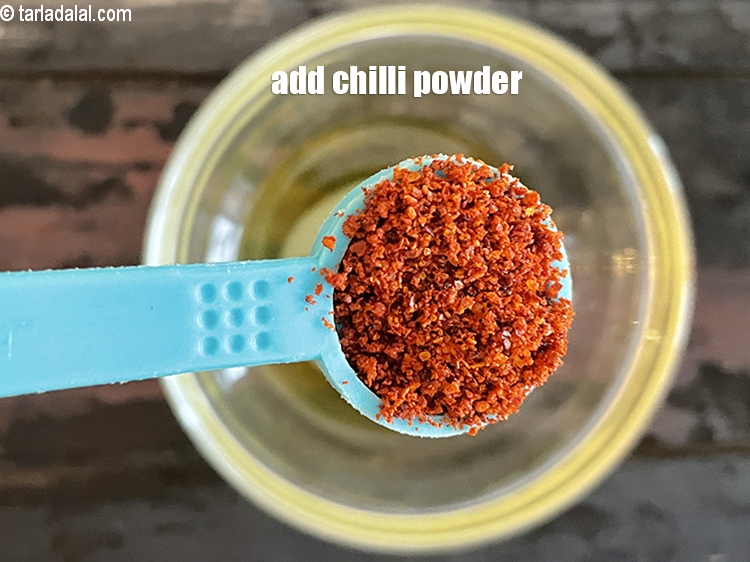 Step 12 – Add&nbsp;1/2 tsp chilli powder.