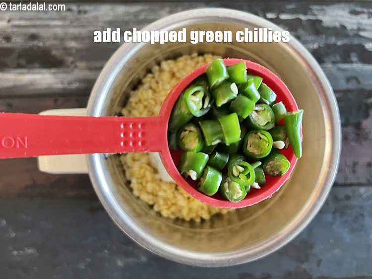 Step 12 – Add&nbsp;<meta charset="UTF-8" />1 tbls roughly chopped&nbsp;<a href="glossary-green-chillies-hari-mirch-331i">green chillies</a>&nbsp;