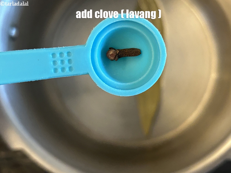 Step 13 – Add&nbsp;<meta charset="UTF-8" />1&nbsp;<a href="glossary-cloves-laung-lavang-322i">clove (laung / lavang)</a>.