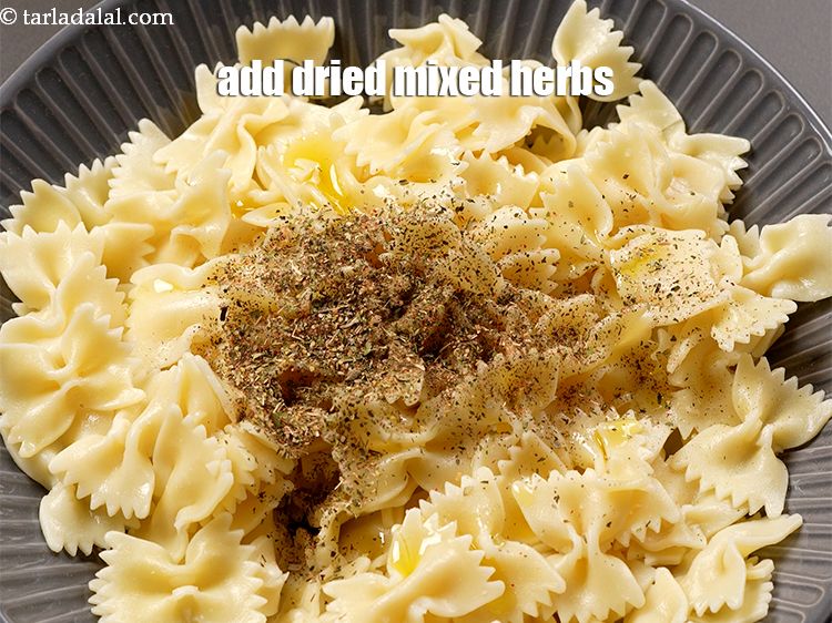 Step 5 – Add 1 tsp <a href="https://www.tarladalal.com/glossary-dried-mixed-herbs-466i">dried mixed herbs</a>.