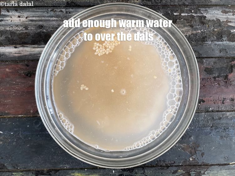 Step 6 – Add&nbsp;enough lukewarm water to cover the dal.
