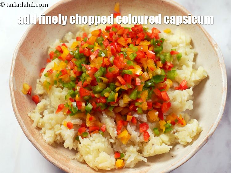 Step 5 – Add &amp;frac12; cup finely &lt;a href=&quot;https://www.tarladalal.com/glossary-chopped-coloured-capsicum-2800i&quot;&gt;chopped coloured capsicum&lt;/a&gt;.