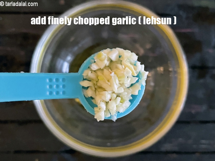 Step 5 – Add <strong>1/2&nbsp;</strong>tsp&nbsp;finely&nbsp;<a href="glossary-chopped-garlic-790i">chopped garlic (lehsun)</a>