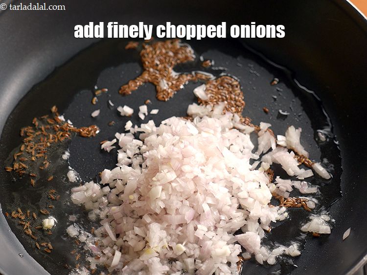 Step 5 – Add &frac12; cup finely <a href="https://www.tarladalal.com/glossary-chopped-onions-722i">chopped onions</a>.