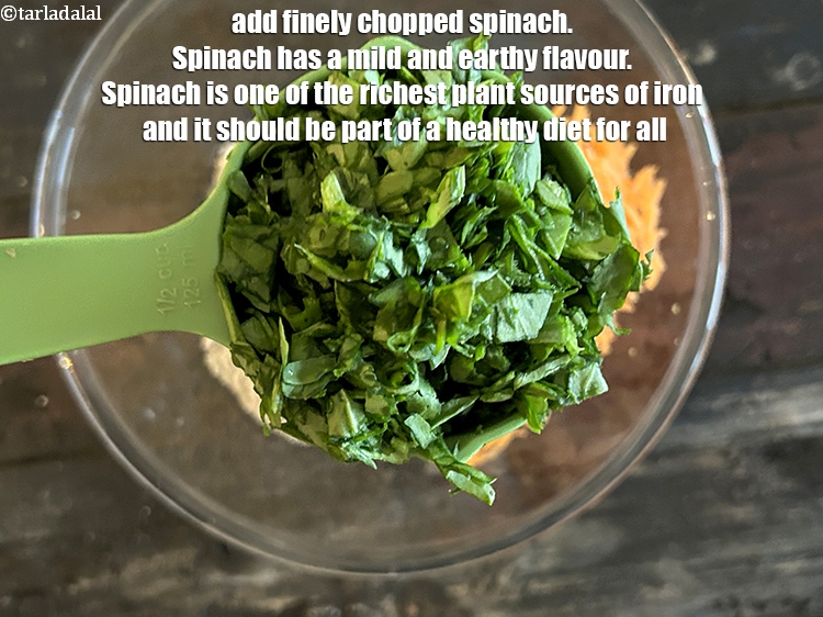 Step 26 – <meta charset="UTF-8" />Add&nbsp;finely&nbsp;<a href="glossary-chopped-spinach-780i">chopped spinach (palak)</a>.&nbsp;Spinach has a mild, earthy flavor that complements the sweetness …