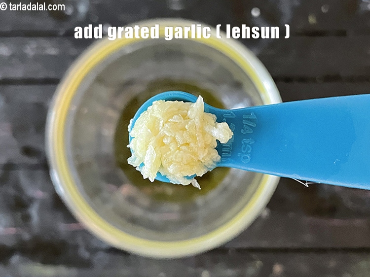 Step 7 – Add&nbsp;<meta charset="UTF-8" />1/4 tsp&nbsp;<a href="glossary-grated-garlic-859i">grated garlic (lehsun)</a>.